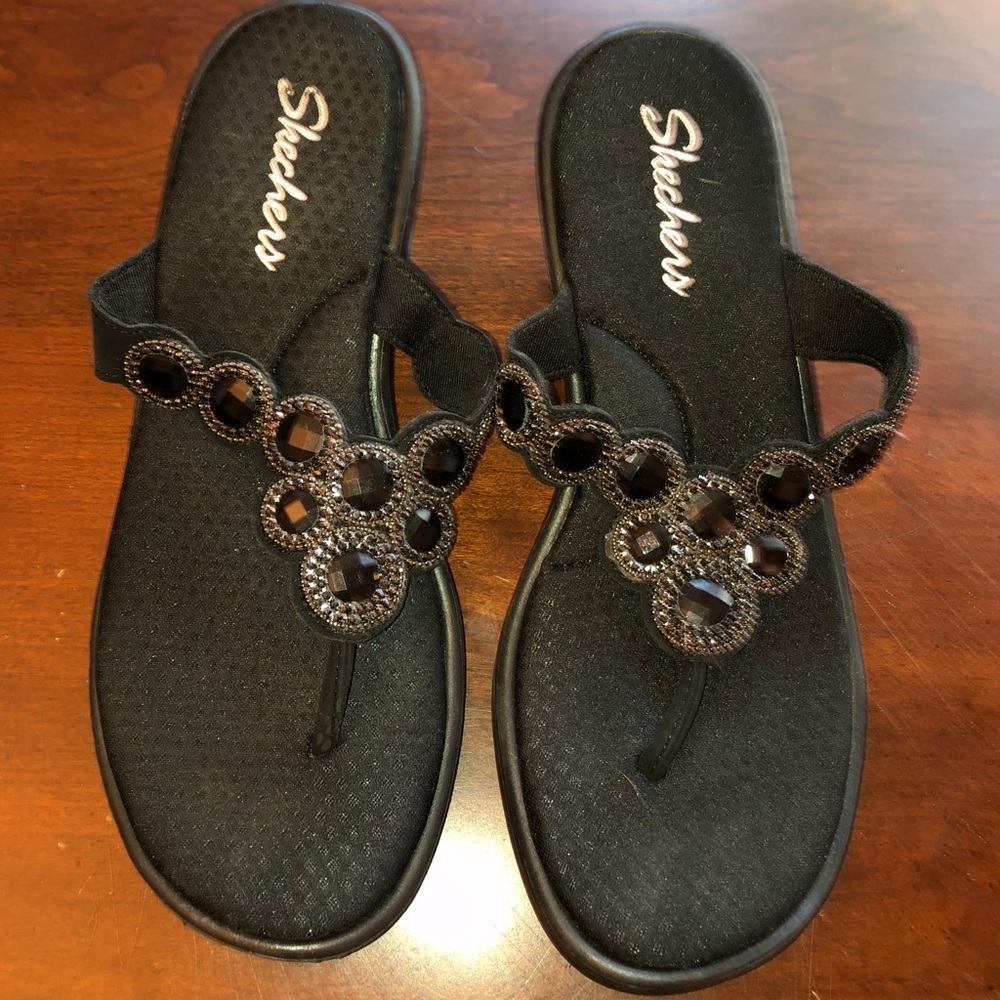 Black Skechers sandals